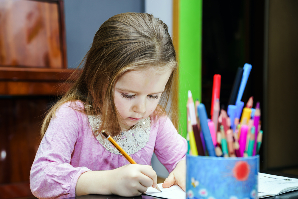 child writing letter to easter bunny